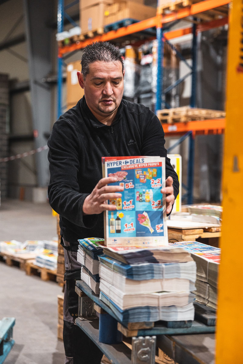 A member of the Field team takes inventory and manages the stock of goods and products.